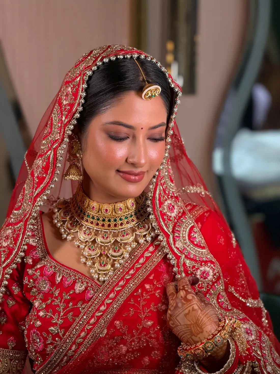 Red Veil Ritual bridal makeup look by Charu Patel