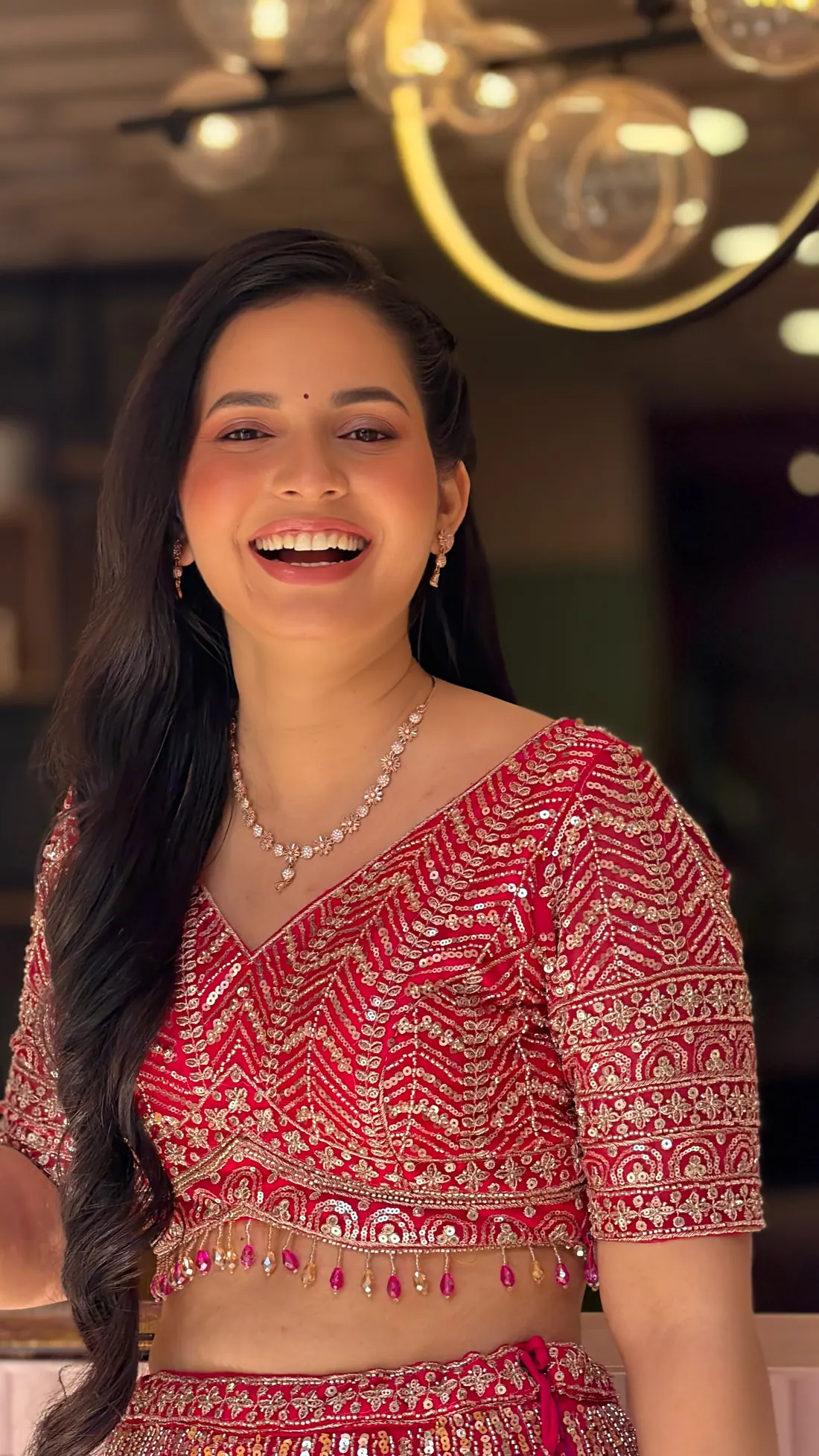 Candid Crimson bridal makeup look by Charu Patel